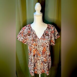 Lovely flower top, soft & silky feel, free flowing.
